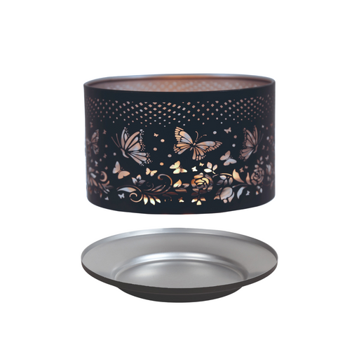 Decorative butterfly-themed candle shade and tray set with intricate cut-out design, illuminated from within, creating a warm and inviting glow—perfect for enhancing home decor and creating a cosy atmosphere.