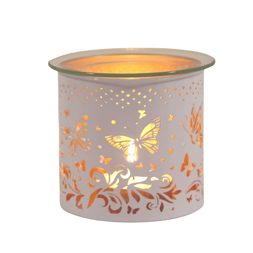 Decorative butterfly-themed candle holder with intricate cut-out design, illuminated from within, creating a warm and inviting glow—perfect for enhancing home decor and creating a cosy atmosphere.