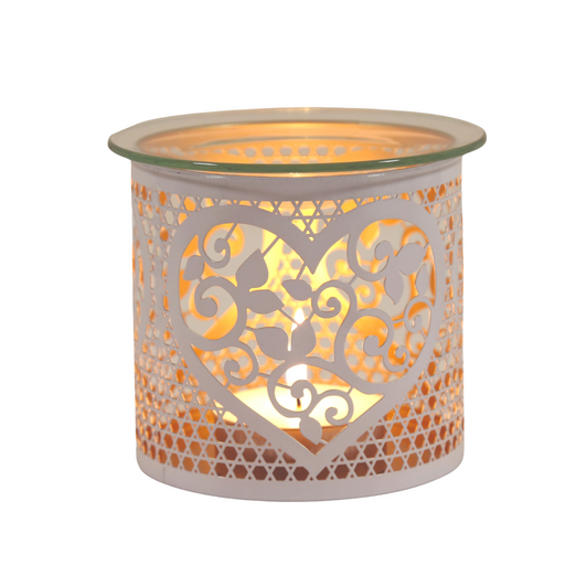 Decorative heart-themed candle holder with intricate cut-out design, illuminated from within, creating a warm and inviting glow—perfect for enhancing home decor and creating a cosy atmosphere.