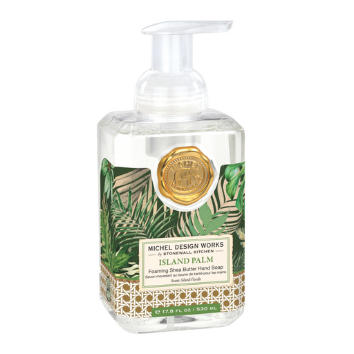 Foaming hand soap bottle with tropical leaf design, featuring Michel Design Works Island Palm label. Packaged with shea butter for moisturising benefits. 530ml